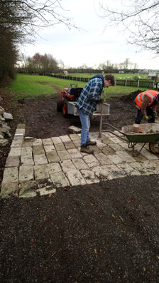 Levelling entrance of public car parking area.