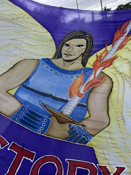 Strong Angel with Firey Sword on a long flag