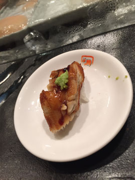 Anago (salt water eel) over rice with a little bit of wasabi. A fresh take on Unagi. Pardon the pun.