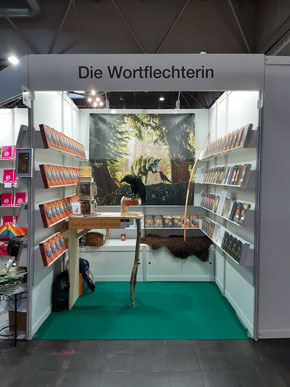 Der Stand der Wortflechterin