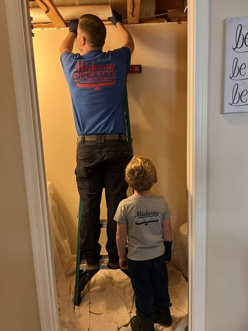 Rick and Talon working on a job