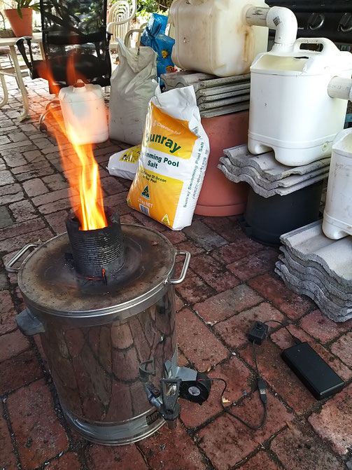 The 'Permastove V1' making biochar from pine cones. Used in the biochar electrodes of the CDI module. The highest recorded temp was 840 degs Celsius