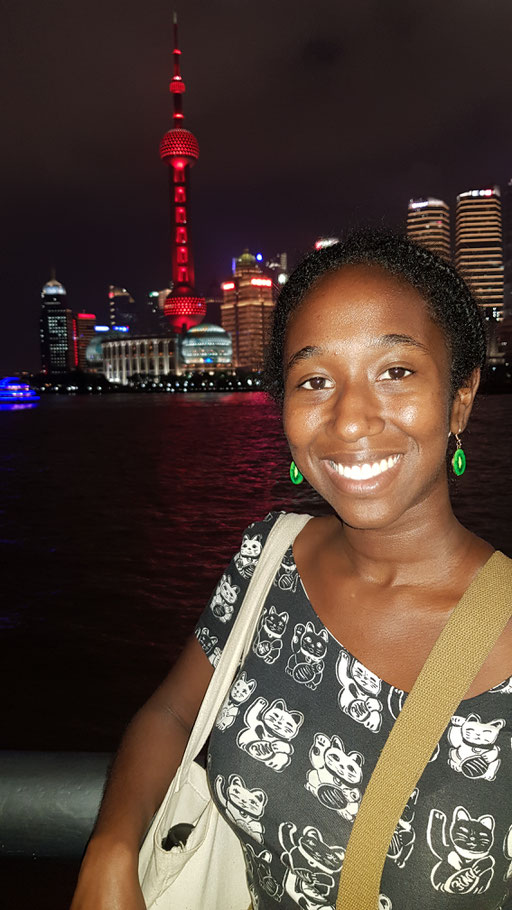 Me at The Bund in Shanghai, repping China with my waving lucky cats