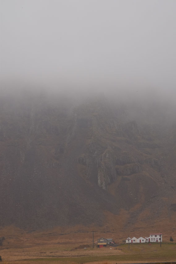 Fog on the old farm house, East Fjords, Iceland