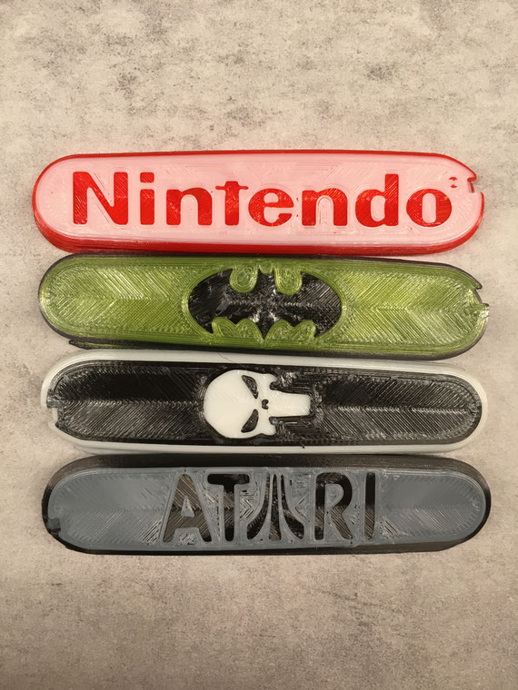 Victorinox scales: Batman, Atari, Nintendo, Punisher