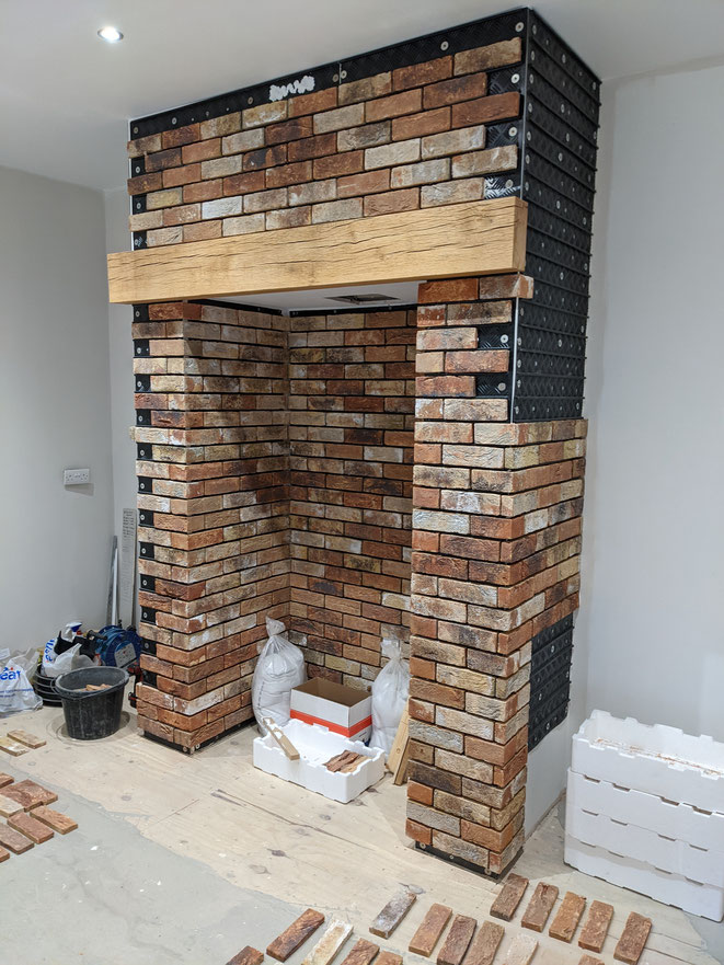 Installation of Birkdale Blend brick slips in conjunction with Brick Slip Tracking Sheets