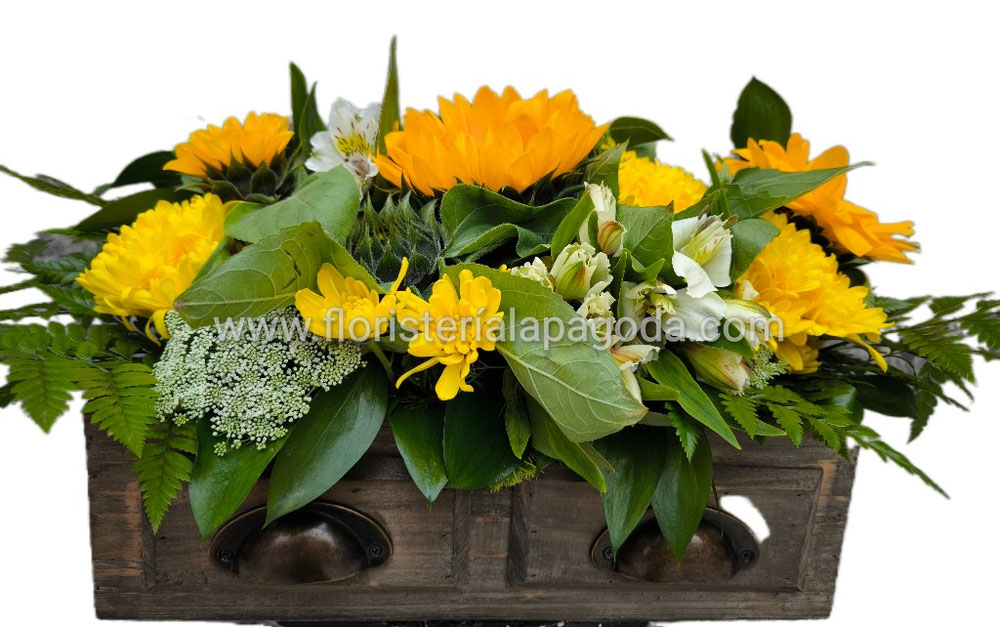 Centro de flores amarillas desde 75€