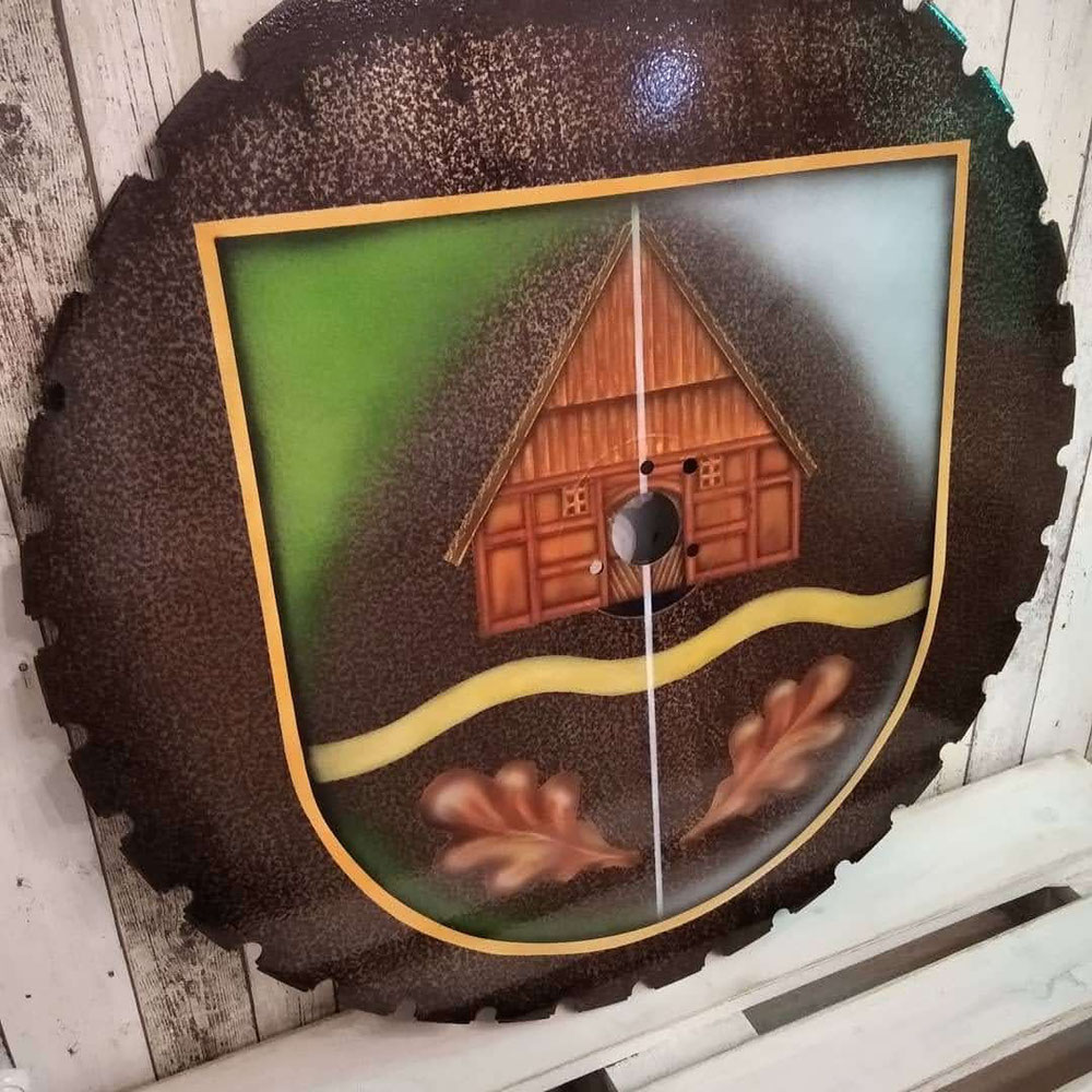 Wappen von Arpsdorf auf einem Sägeblatt