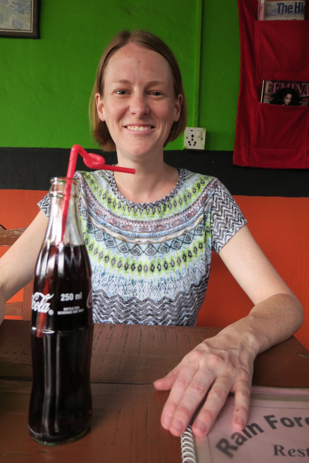 Sara Enjoying Her Coke at a Lakeside Restaurant 