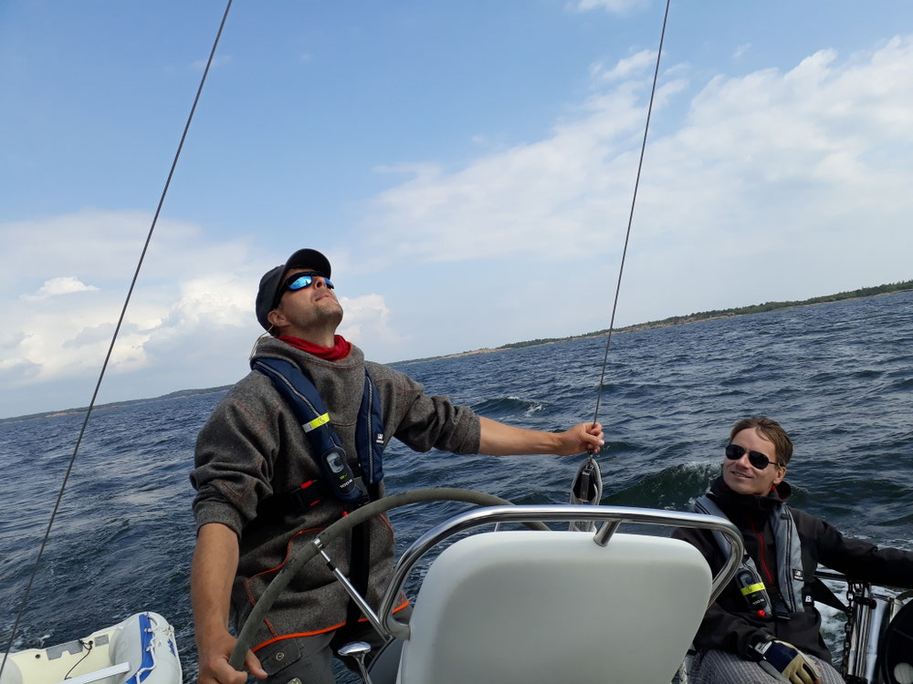 Morten on the helm &Thomas 