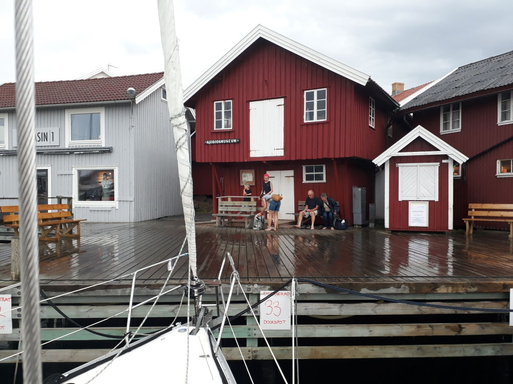 Family leaving in the rain
