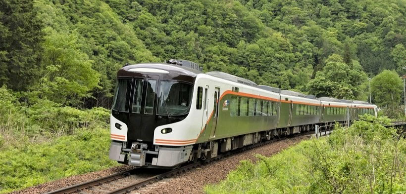 Train journey from Tokyo to Takayama through mountains.