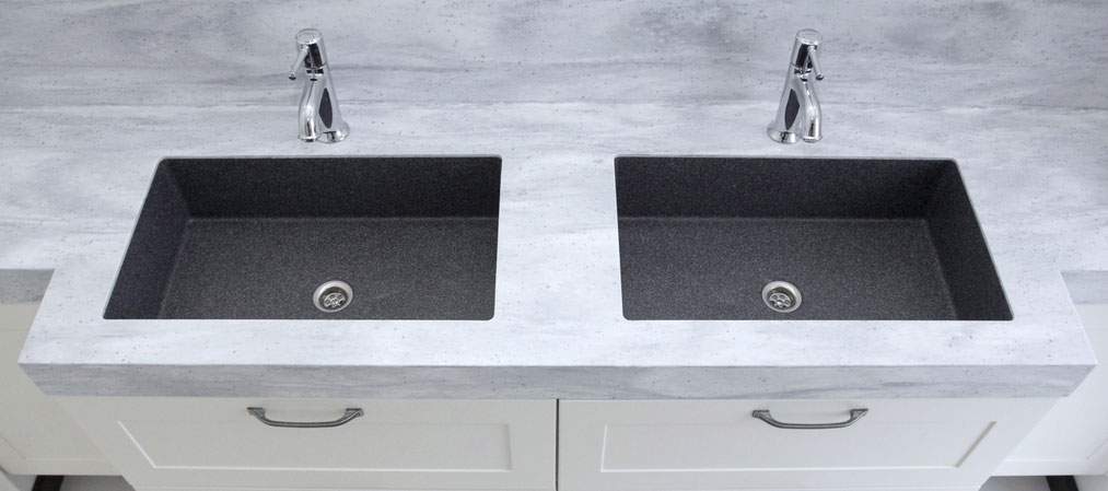 Grey solid surface vanity with two sinks