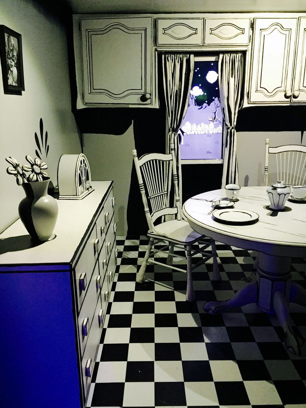 black and white kitchen table meow wolf