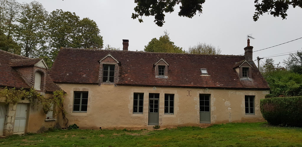 Façade aprés travaux d'enduit de chaux et ouvertures en pierres