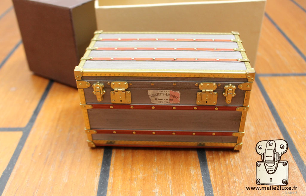 Authentic-style Louis Vuitton 1899 Explorateur zinc trunk miniature, faithfully crafted with vintage patina.