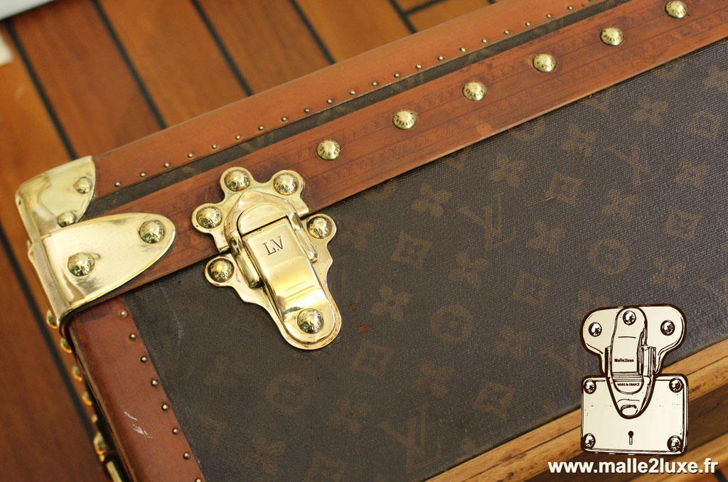 Louis Vuitton trunk left hand clasps