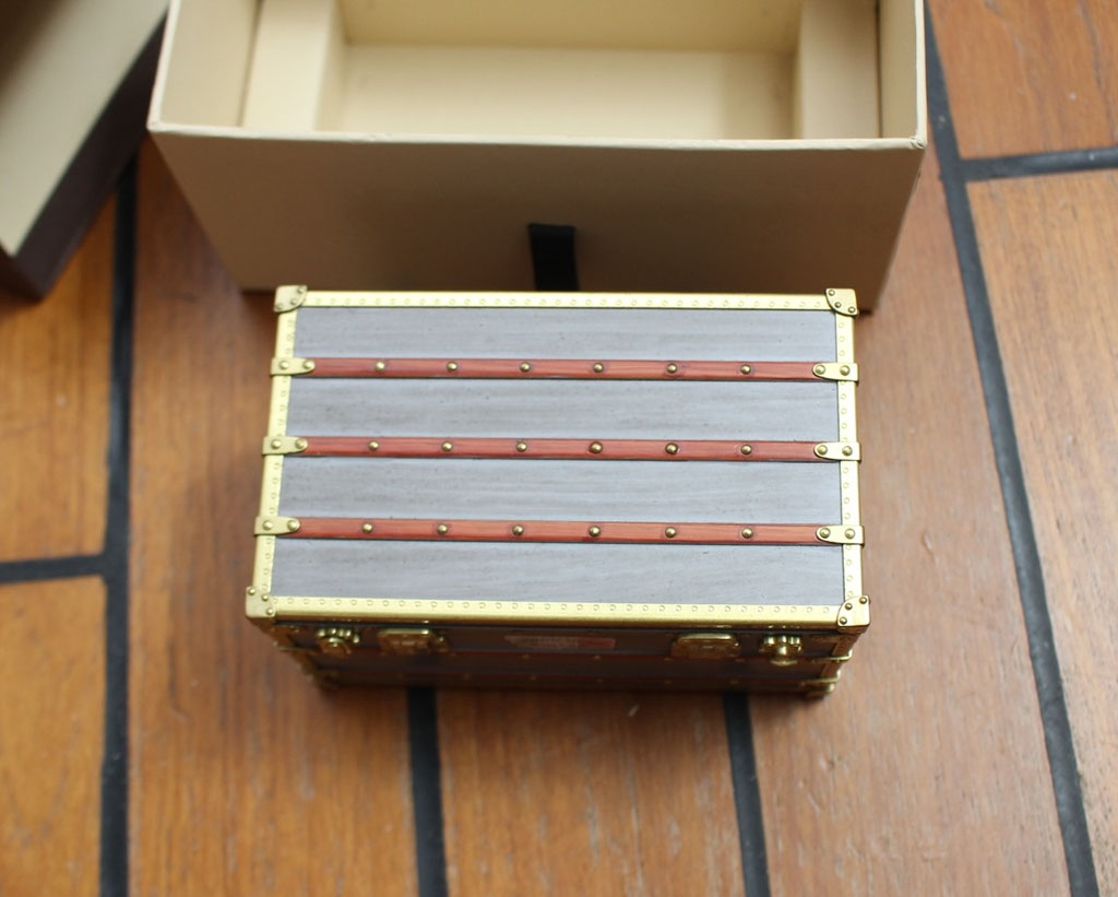 Museum-inspired Louis Vuitton zinc mini trunk, 1899 Explorateur model, exquisitely patinated by hand.