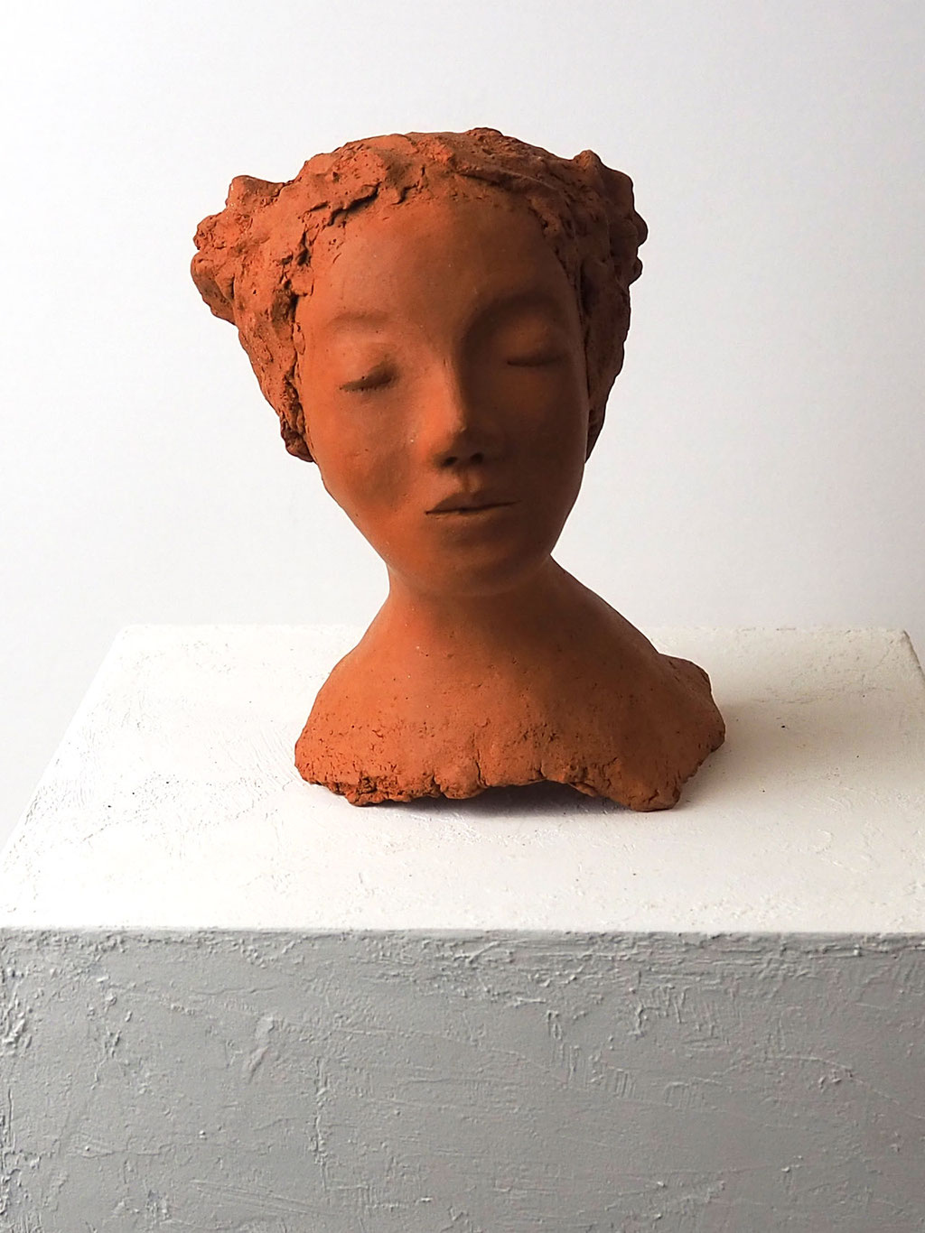 Keramikskulptur Gesicht aus rotem Ton