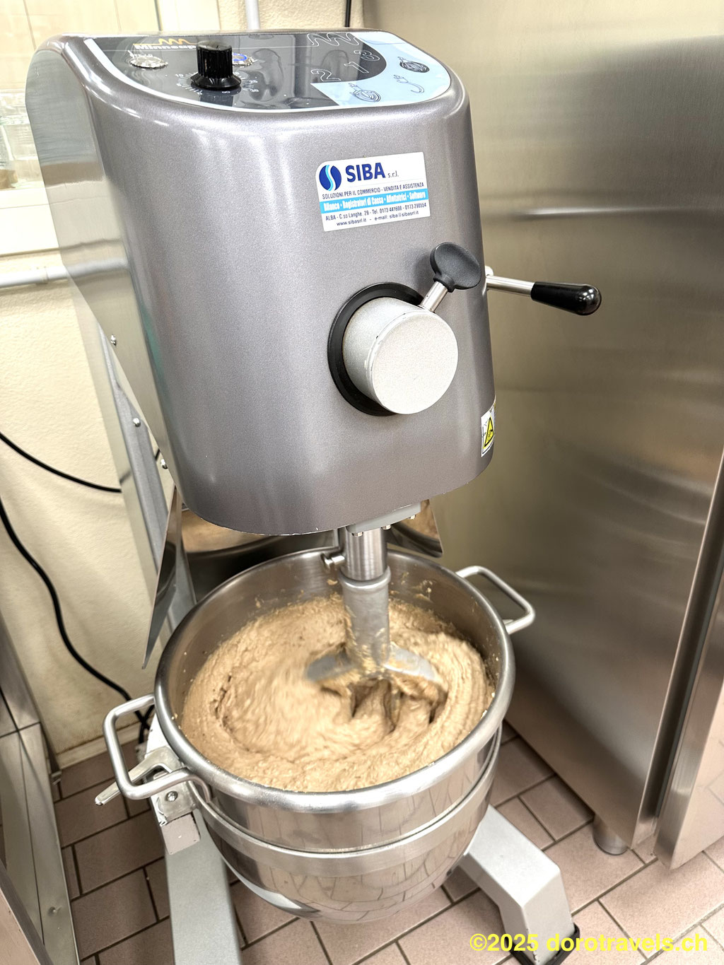 HAZELNUTS BEING GROUND INTO A PASTE