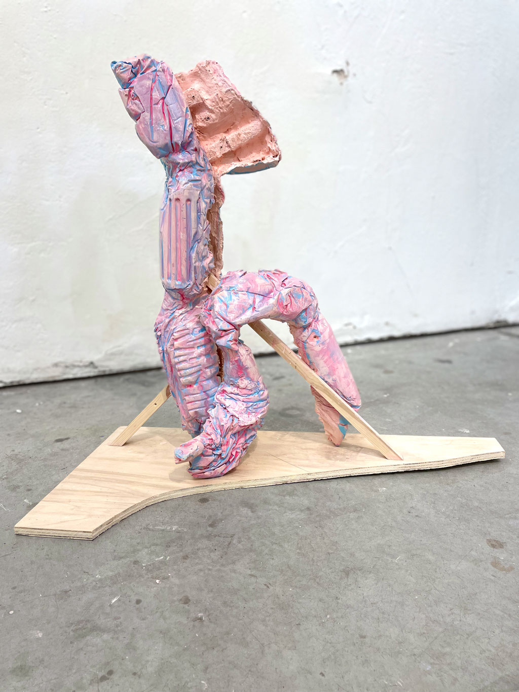 Formaunica #24323, 2023, stained and painted gypsum, jute, wood, 60x70x80 cm