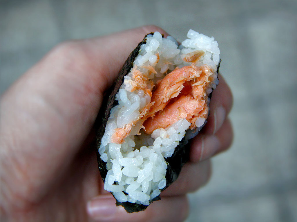 My favorite snack, Onigiri! This one is filled with salmon. Very delicious. They sell them everywhere for about 100 -150 yen. Japan 2013 © Sabrina Iovino | JustOneWayTicket.com