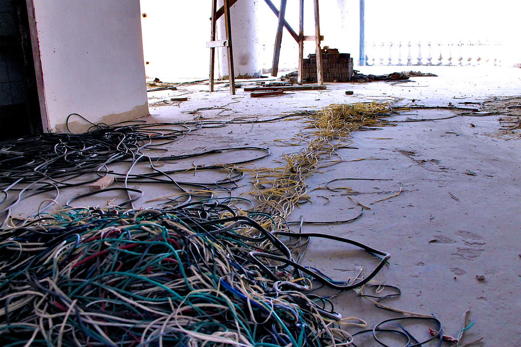 Cables and construction tools were scattered everywhere in the Sathorn Unique Building © Sabrina Iovino | JustOneWayTicket.com