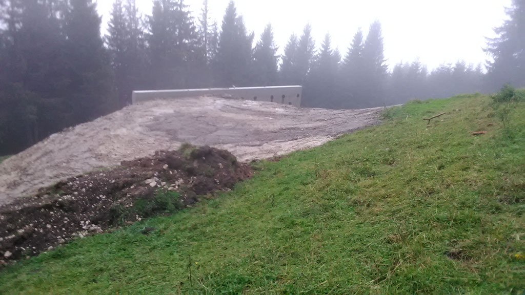 Gelände anfüllen Lawinenschutzwand