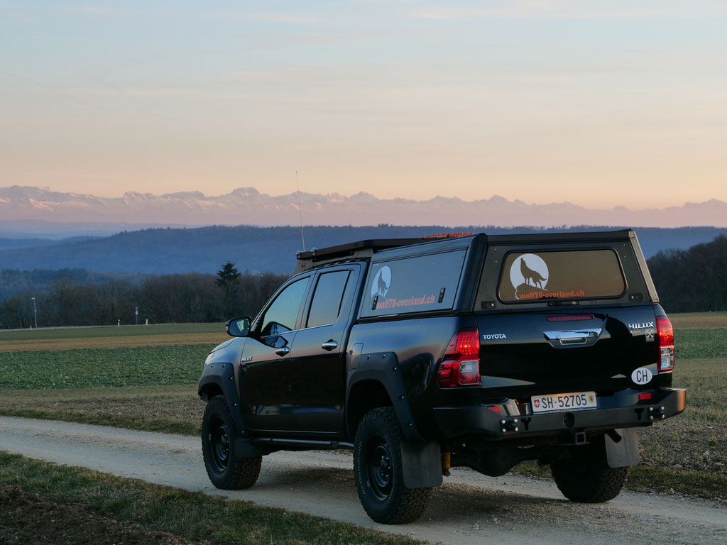Toyota Hilux Revo 2017 2.4 #ProjektBlackwolf Alu-cab offroad overland expedition 4x4  ARB Frontrunner Rocksliders Roofrack Rival skidplate James Baroud Discovery Awining Markise bfgoodrich 285/70R17 33" Tires TJM Sknorkel wolf78-overland.ch