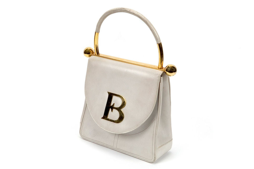 Bolso de mano en cuero con el primer anagrama de Elio, “EB” con las letras sobrepuestas, 1969