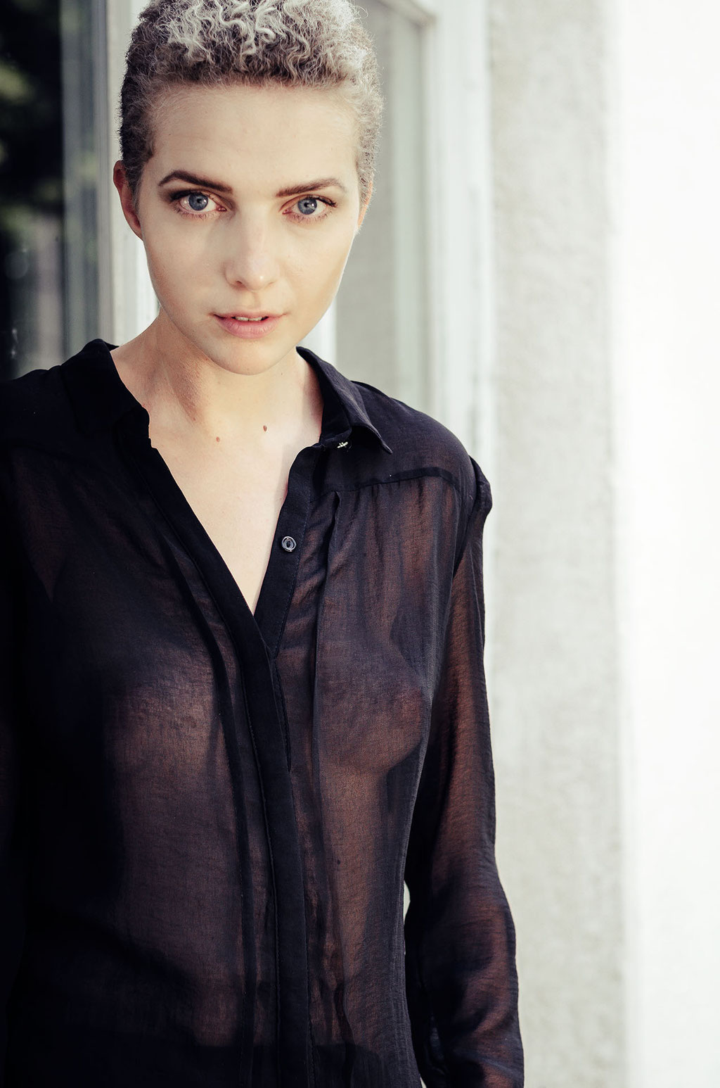 Fashion photo of Anna Avramenko with a semi transparent shirt