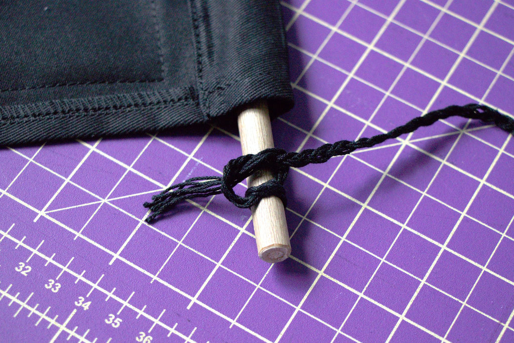 How to make a Back Patch Wall Hanging - attach hanger cord to dowel - Zebraspider Eco Anti-Fashion