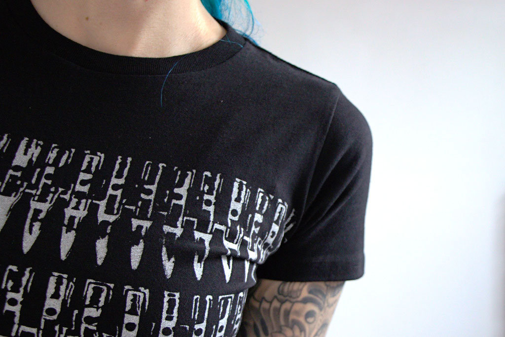 The original bullet shirts are back and more! - Detail silver print on organic black Tee - Zebraspider Eco Anti-Fashion