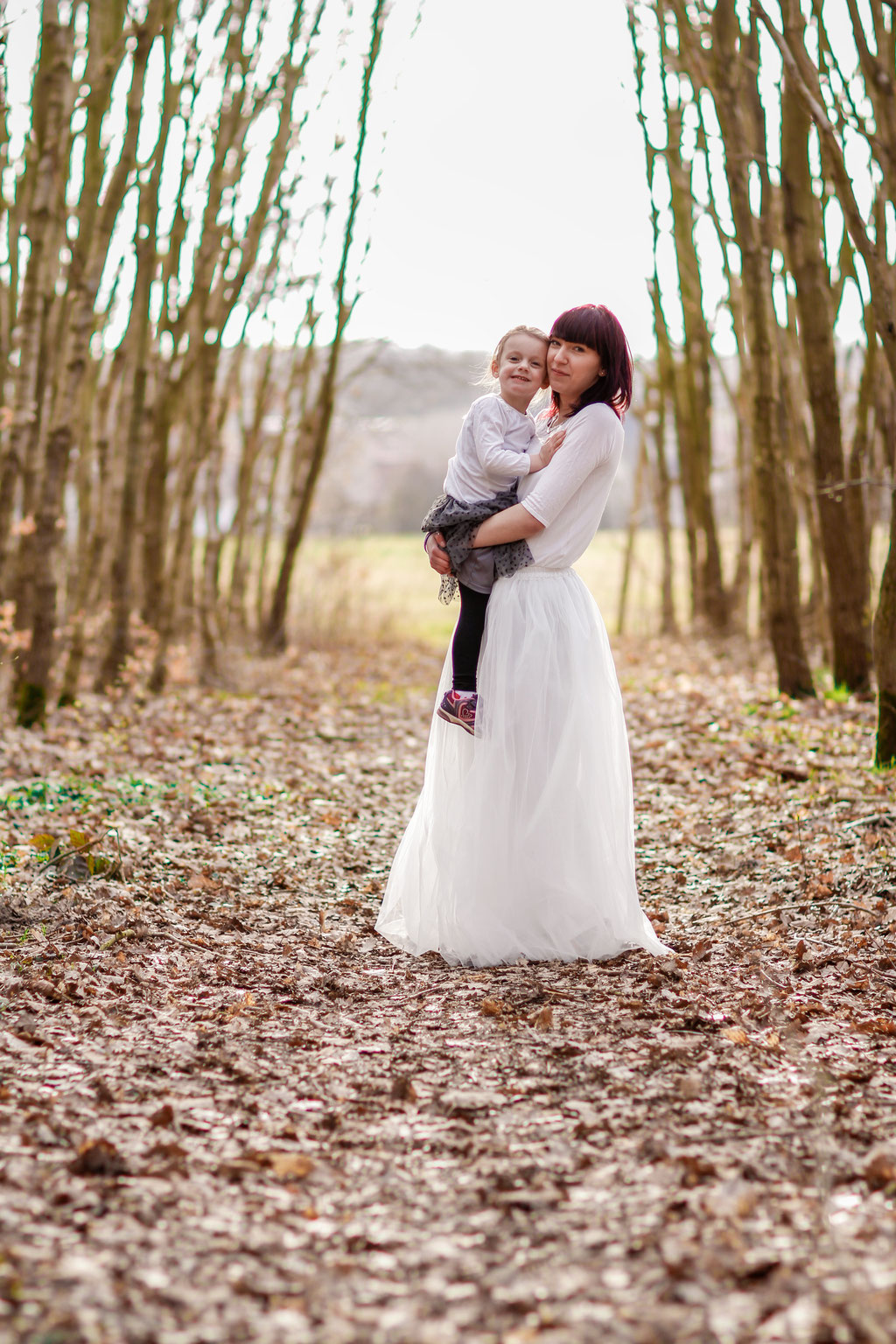 Familienshooting mit Jessica, Steven & Romina| Hendrikje Richert Fotografie| outdoor| Wald| Tüllrock| Familie| Mädchen| Kinderfotografie| Familienfoto| märchenhaft|