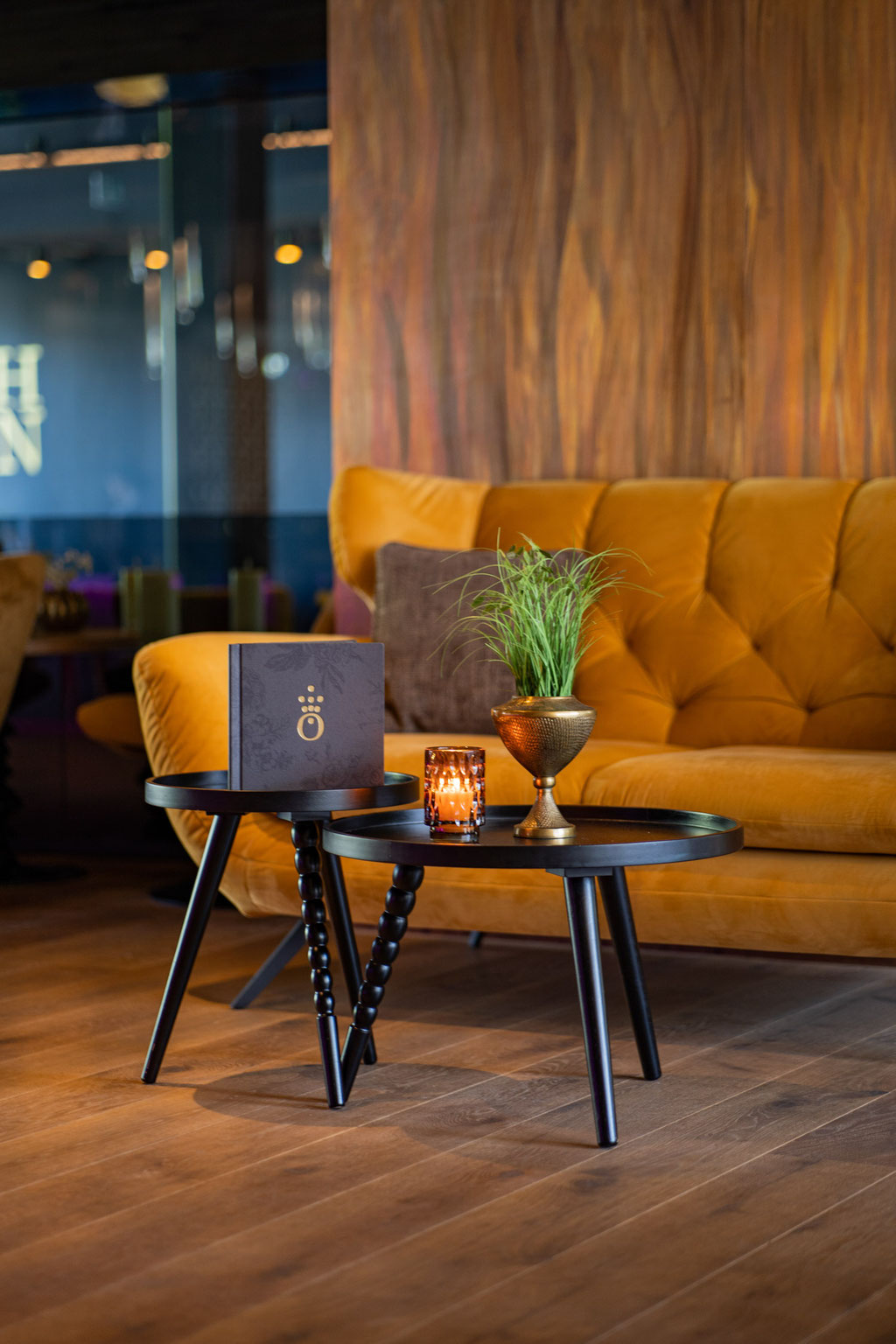 A cosy lounge with designer furniture at the Hochkönigin Wellness Hotel in Maria Alm, Salzburg