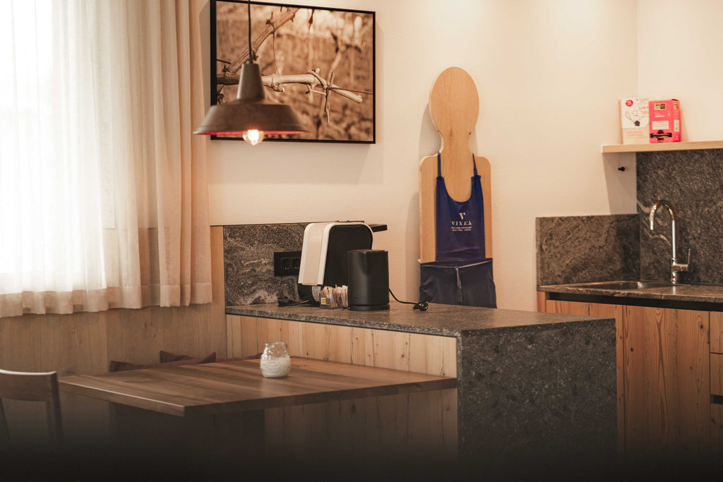 Kitchen in an apartment at VINEA Suites & Apartments
