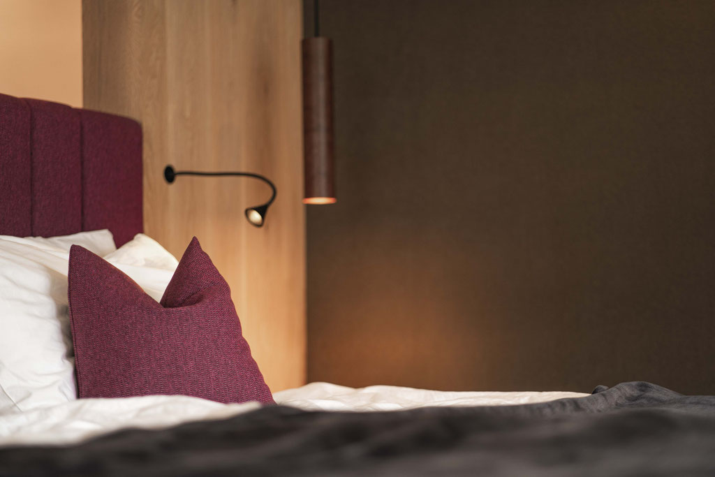 Modern double bedroom at VINEA Suites & Apartments, South Tyrol
