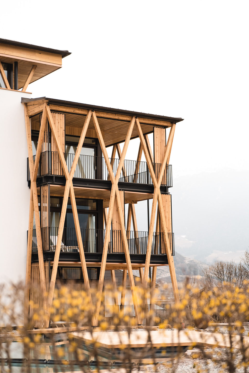 The Garberhof’s modern architecture, featuring striking wooden balconies and views of the Alpine landscape.