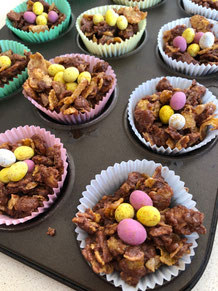 Adding the mini eggs to complete the easter nests
