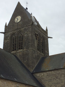 A historic and a filming site for "The Longest Day": the church tower in Sainte-Mère-Eglise. 