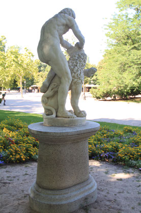 During the stagecoach chase in John Wayne's "Circus World", "French" gendarmes pass the marble statue of the Estatua de Hercules, in Madrid's Retiro Park.