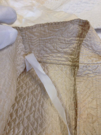 C18th quilted bedgown, showing collar band. BATMC 97.18 (loan)