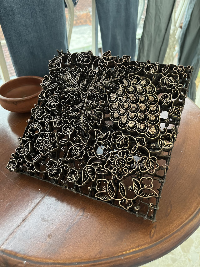 Metal batik stamp laying on table, Yogjakarta.
