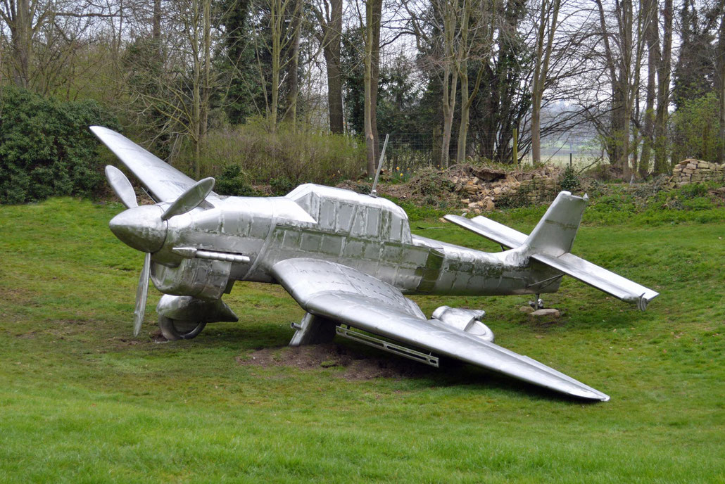 Contemporary sculpture of a crashed STUKA JU 87 by sculptor HEX at Burghley House, Stamford. HEX is a Fellow of the Royal British Society of Sculptors.