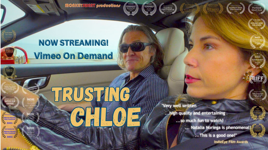 Picture of Todd Long and Natalia Noriega with winning laurels and blurbs for *Trusting Chloe* at film festivals.