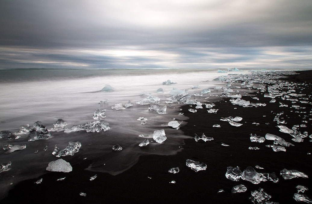 Ice looking like diamonds on black sand at diamond beach, Jökulsarlon, Austurland, Atlantic Ocean, Iceland