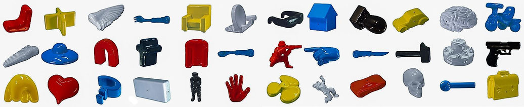 Kies en verander — overzicht van diverse kleine polyester vormpjes in verschillende kleuren en vormen, gepresenteerd in rijen op een witte achtergrond.