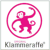 Logo der Klammeraffe®-Lesebrillen, pinkfarbiger Affe im Kreis.