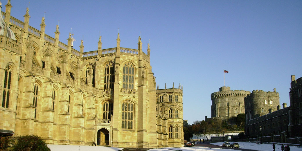 St. George’s Chapel at Windsor Castle, a stunning example of English Gothic architecture. The chapel, completed in 1528, serves as the spiritual home of the Order of the Garter.