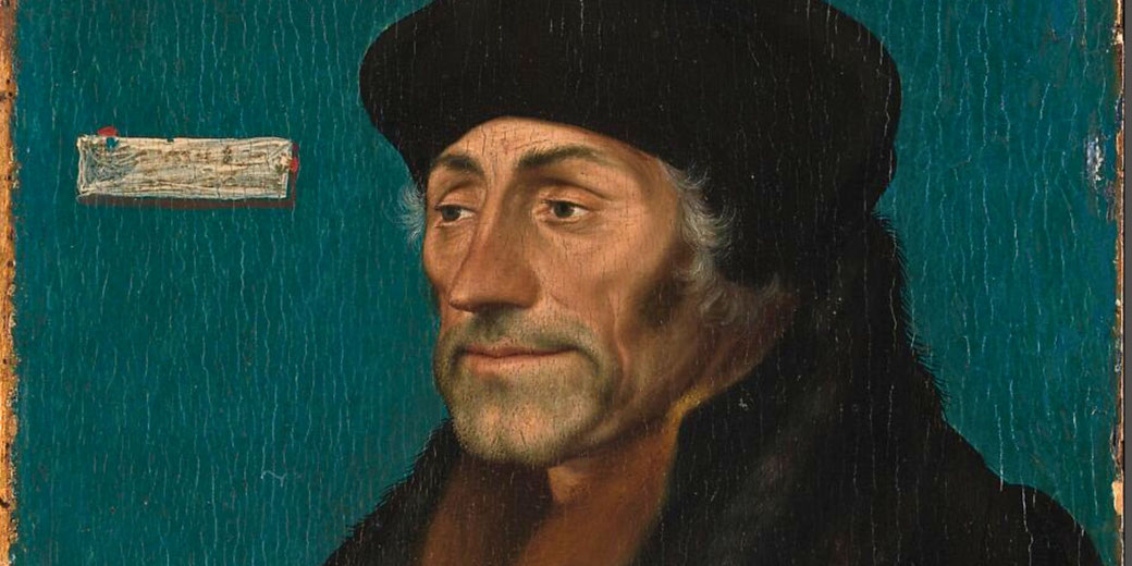 A half‑length portrait of the scholar Erasmus showing his grey hair under a black cap, lined face, dark eyes, and his hands faintly visible at his coat’s fur‑lined cuffs.